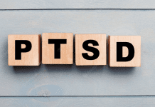 Letter tiles spelling out PTSD