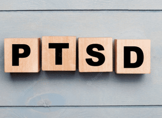 Letter tiles spelling out PTSD