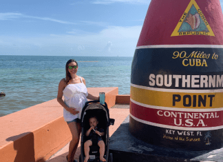 Jessica, pregnant and with her toddler the Southernmost Point in Key West