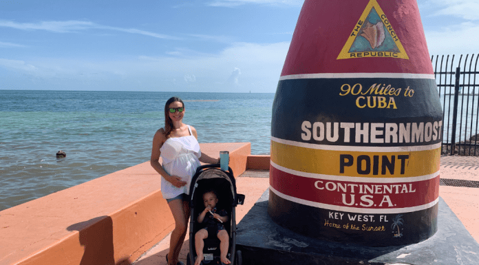 Image: Jessica, pregnant and with her toddler the Southernmost Point in Key West
