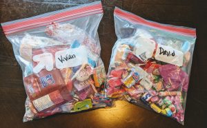 2 gallon-sized Ziploc bags of leftover candy