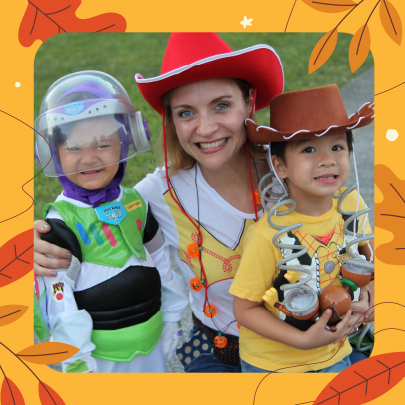 A mom with her two sons in Toy Story themed costumes