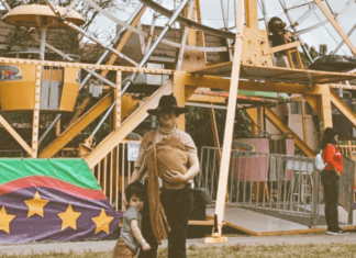 Jacqueline at a carnival with her children