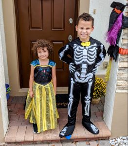 Two kids dressed up for Halloween