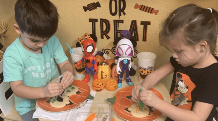 Decorating pumpkin cookies