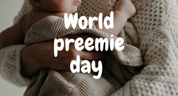 A mother holding an infant with text that reads, "World Preemie Day"