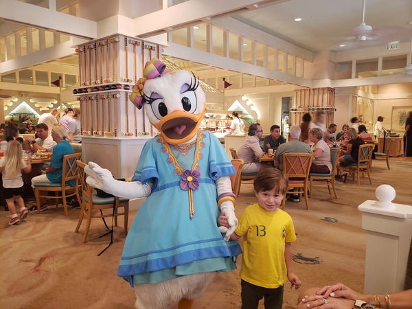 Marcelo with Daisy Duck