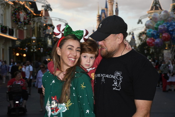 Sandra with her family at Disney for the holidays in 2022