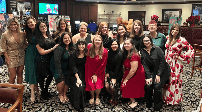 Members of the Miami Mom Collective Team at the team Christmas party at Trump Doral