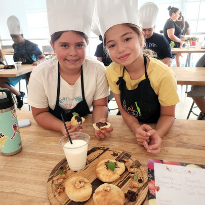 Image: Two children enjoying camp at Real Food Academy