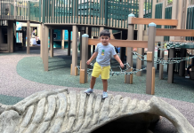 Image: A child enjoying the playground at Sugar Sand Park