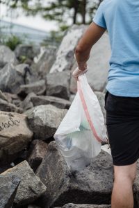 Image: A child picking up trash