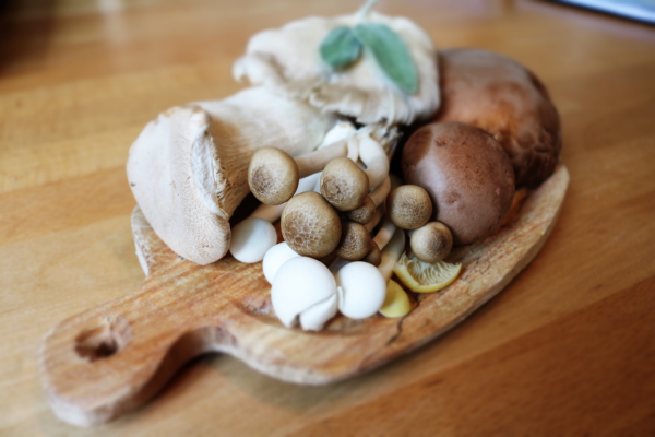 Image: Mushrooms on a wooden serving plate