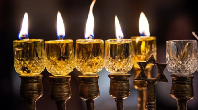 Image: Candles lit on Hanukkah menorah