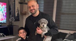 Kaegan's husband, son, and their family dog