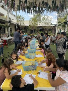 Image: Children participate in an art activity at the Doral Yard, hosted by Comic Kids